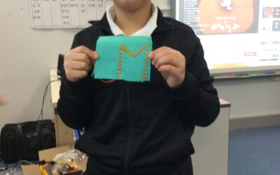 Muhammad’s finished cross stitching
